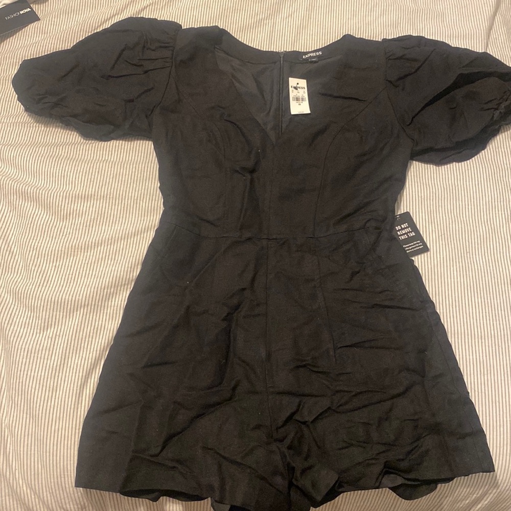 Express romper with puffy sleeves and pockets